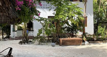 Furaha Lodge Ă droite sur la plage de sable blanc de Jambiani