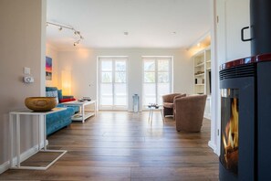 TV, fireplace - Half of the house Oasis 3 (ID 381) (Sankt Peter-Ording)