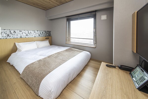 Desk, laptop workspace, blackout drapes, iron/ironing board