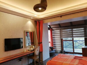 Design kamer, 1 twee- of 2 eenpersoonsbedden | Een minibar, een kluis op de kamer, een bureau, verduisterende gordijnen