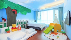 A children's room with a bed, a play area, and a window with curtains. - Beautiful Village (Wujie)