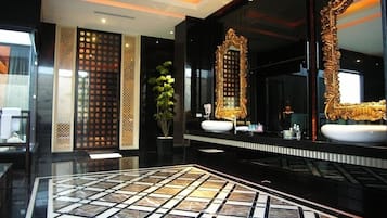 Premium bedding, down comforters, Select Comfort beds, free minibar