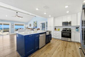 Fridge, microwave, oven, stovetop - THIS BEAUTIFUL GROUND LEVEL HOME has gorgeous tile and hardwood floors, and an artistic flair! (St. George Island)