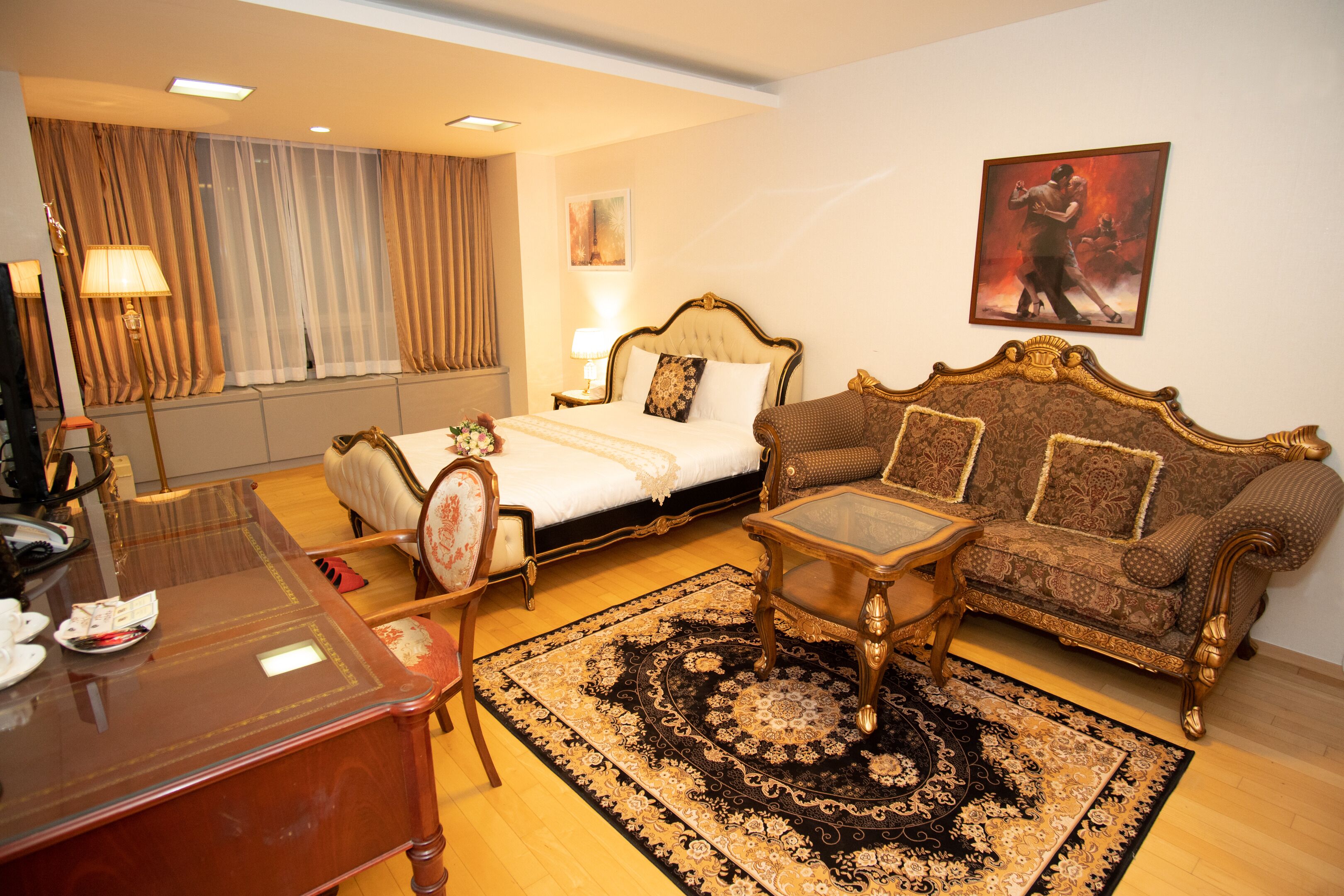 deluxe double room | individually decorated, individually furnished, desk, blackout curtains