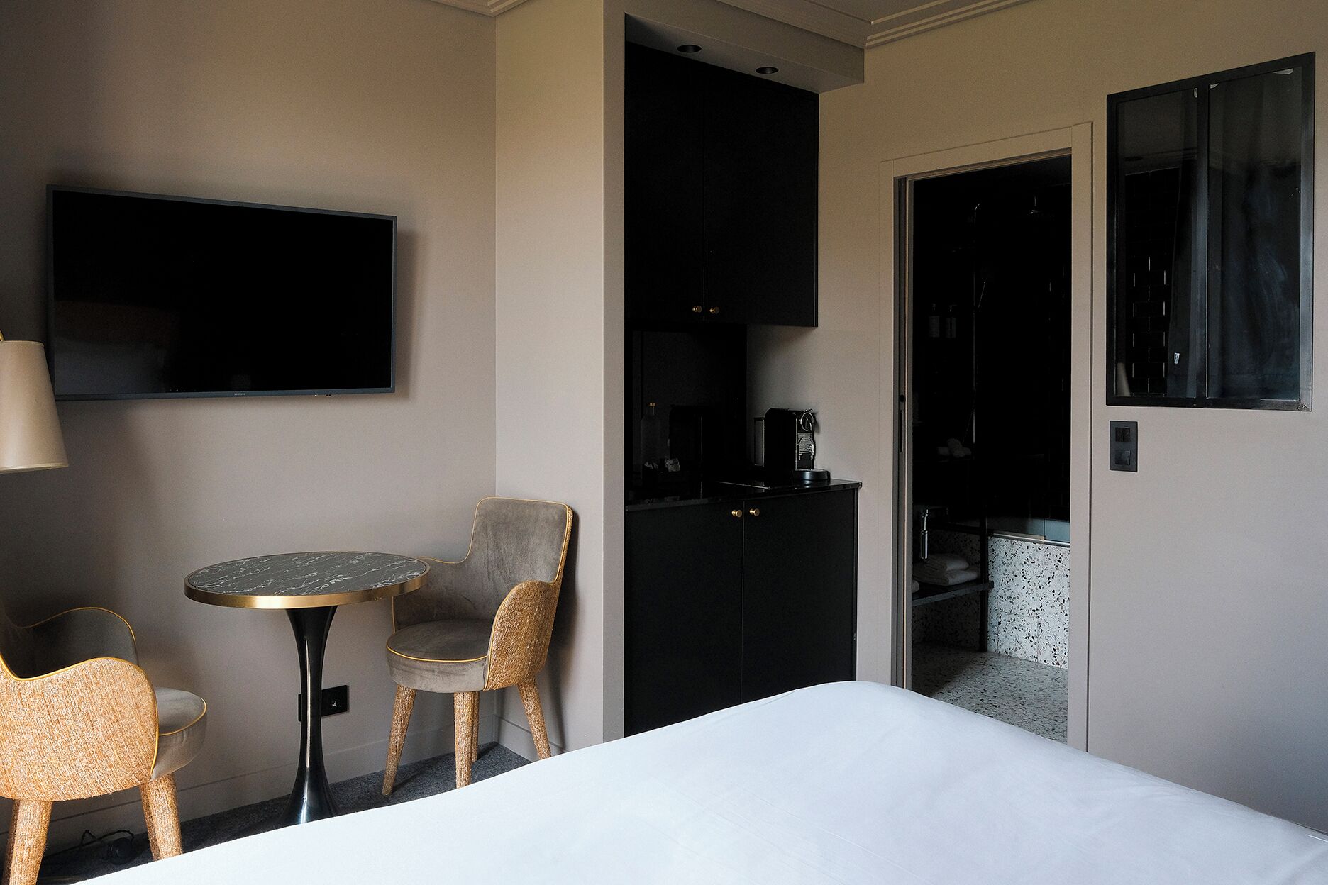 mini-fridge, microwave, stovetop, espresso maker