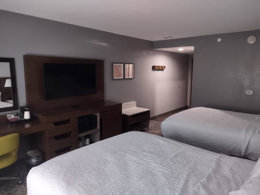 Room, 2 Queen Beds, Refrigerator & Microwave | Blackout drapes, iron/ironing board, free cribs/infant beds, free WiFi