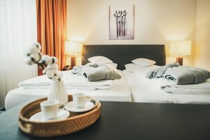 Suíte | Frigobar, cofres nos quartos, quartos à prova de som, berços grátis