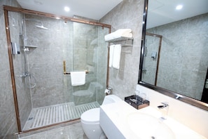 Business Double Room | Bathroom | Shower, free toiletries, hair dryer, slippers