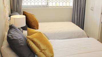 Apartemen, 3 kamar tidur | 3 kamar tidur, setrika/meja setrika, Wi-Fi gratis, dan seprai linen