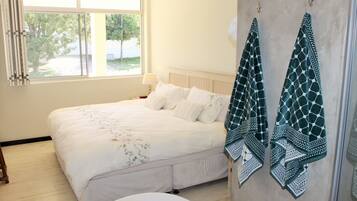 Apartemen, 3 kamar tidur | 3 kamar tidur, setrika/meja setrika, Wi-Fi gratis, dan seprai linen