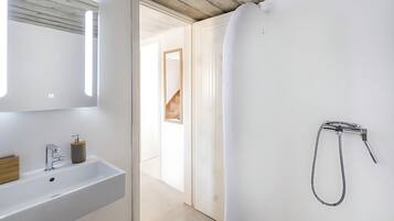 Combined shower/tub, hair dryer, towels, soap