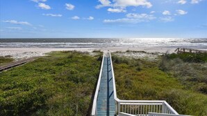 A wooden boardwalk leading to a beach with a clear view of the ocean. - LET AN IRISH SEABREEZE WISK YOUR CARES AWAY! (St. George Island)
