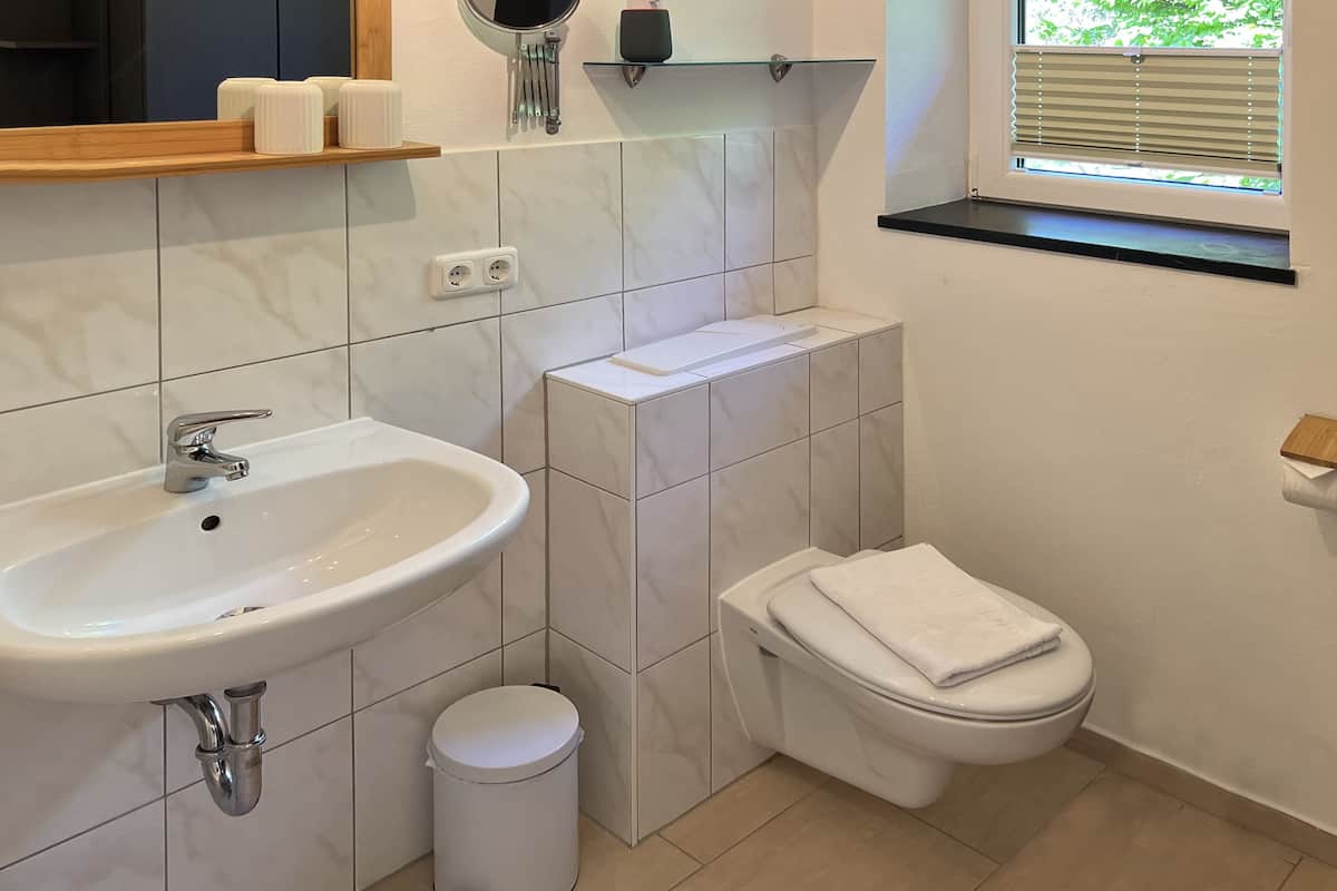 comfort suite | bathroom | hair dryer, towels