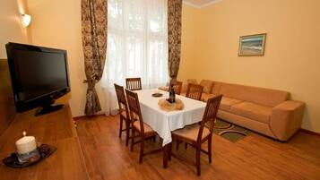 Family Apartment | Living area | Flat-screen TV