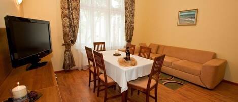 Family Apartment | Living area | Flat-screen TV