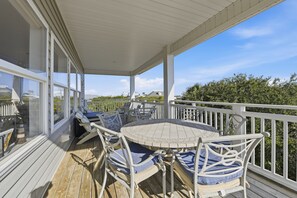 Outdoor dining - THE MINUTE YOU STEP INTO A WAVE FROM IT ALL, you understand the name! (St. George Island)