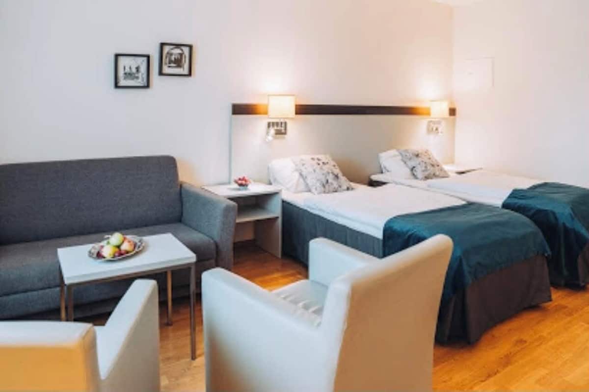 Family Quadruple Room, 1 Bedroom | Desk, laptop workspace, free WiFi, bed sheets