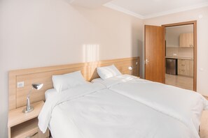 Studio | Premium bedding, down duvets, memory-foam beds, individually furnished