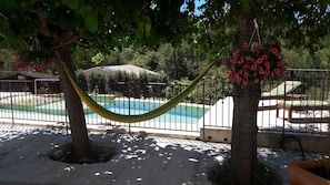 Seasonal outdoor pool, pool umbrellas, pool loungers