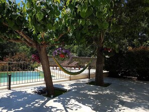 Seasonal outdoor pool, pool umbrellas, pool loungers