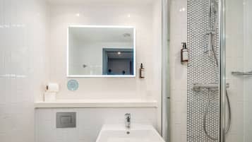 Shower, free toiletries, hair dryer, towels