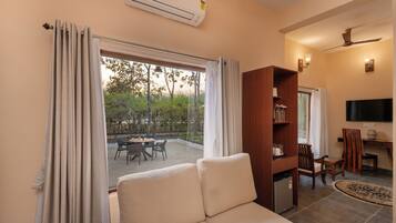 Independent Villa | Living area | 32-inch LCD TV with cable channels, TV