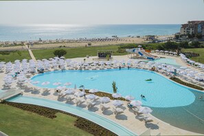 Outdoor pool, open 8:00 AM to 6:00 PM, pool umbrellas, pool loungers