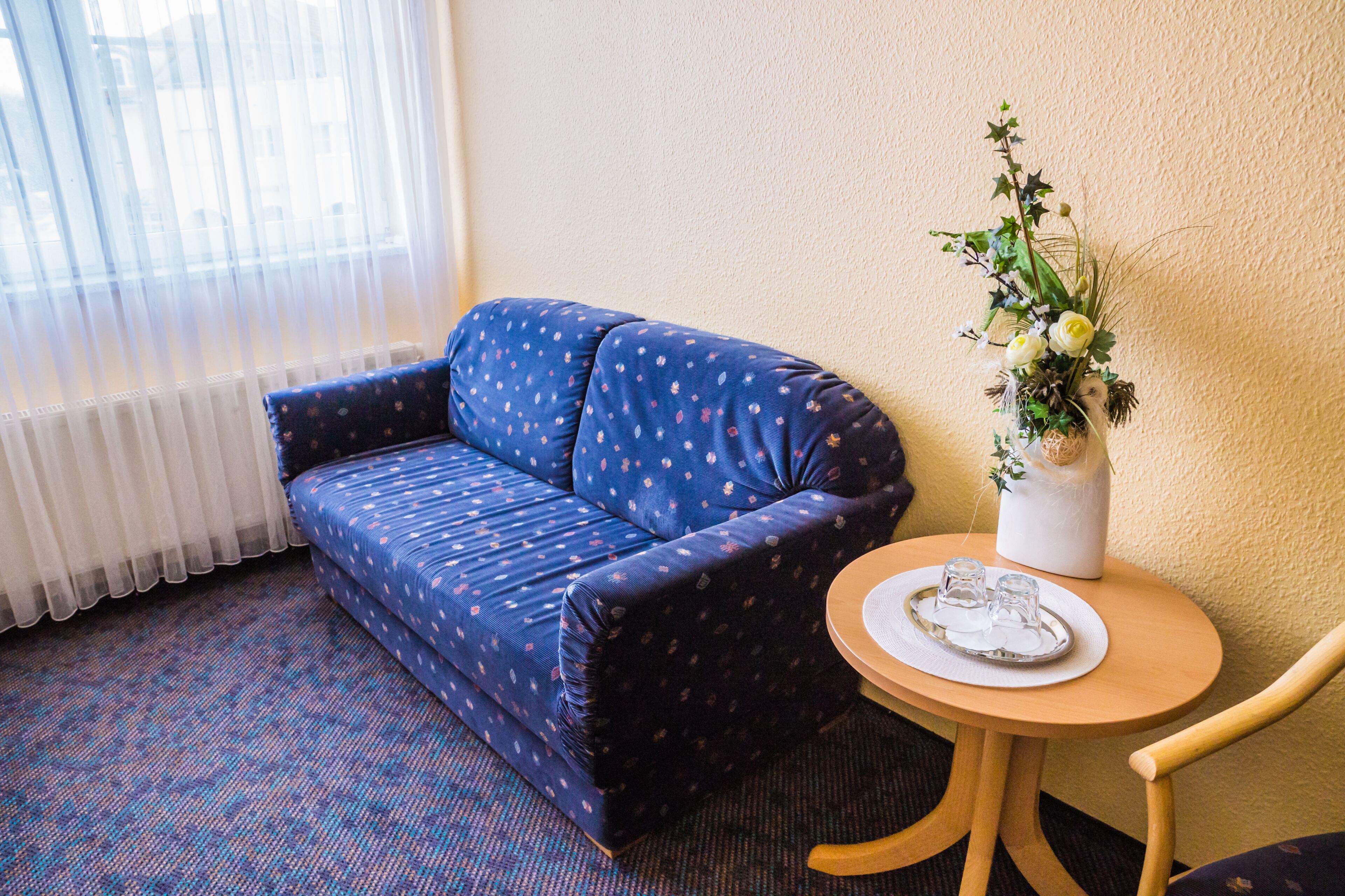 premium double room, 1 double bed with sofa bed, non smoking, city view | living area | flat-screen tv