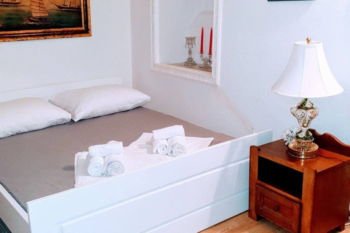 Apartment (Split Level) | Desk, blackout drapes, soundproofing, iron/ironing board