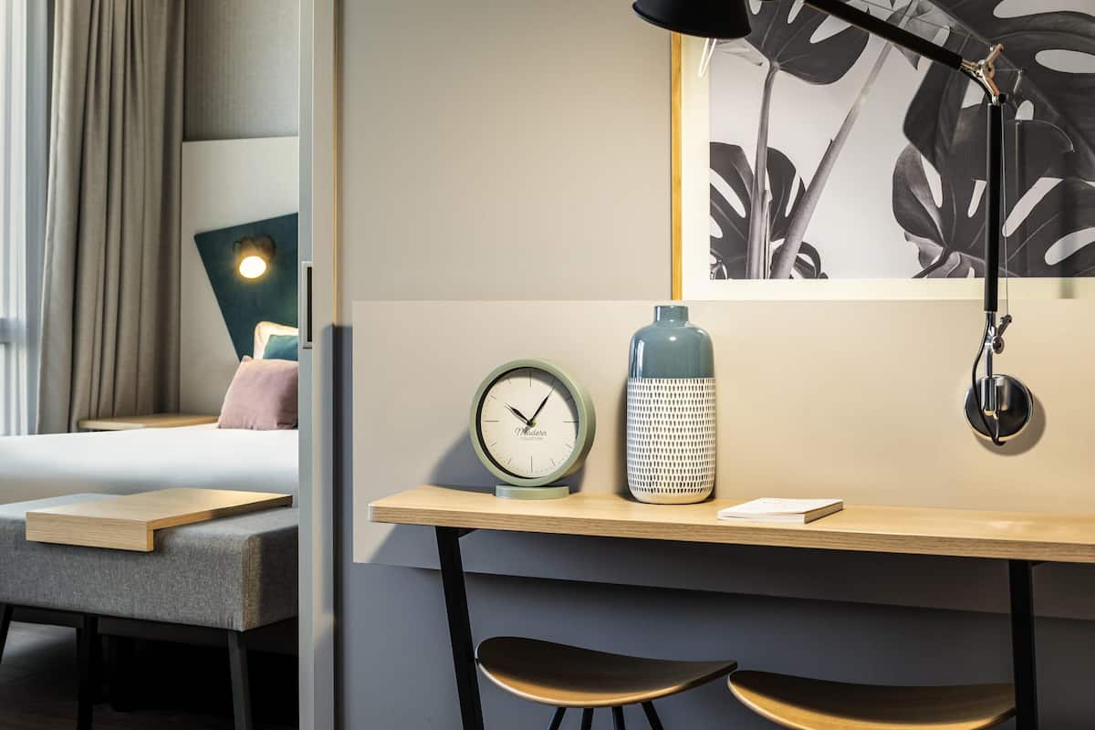 Apartment, 1 Bedroom | In-room safe, desk, blackout drapes, iron/ironing board