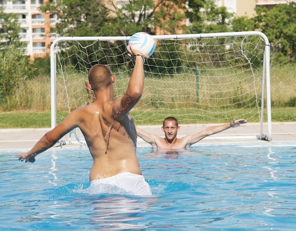 Seasonal outdoor pool, pool umbrellas, pool loungers