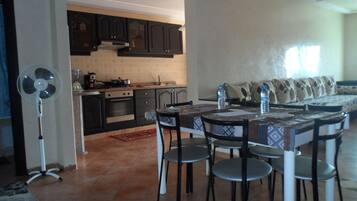 Apartment | Private kitchen | Full-sized fridge, oven, stovetop, coffee/tea maker