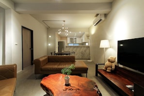 City Apartment | Living area | 40-inch LED TV with cable channels, TV
