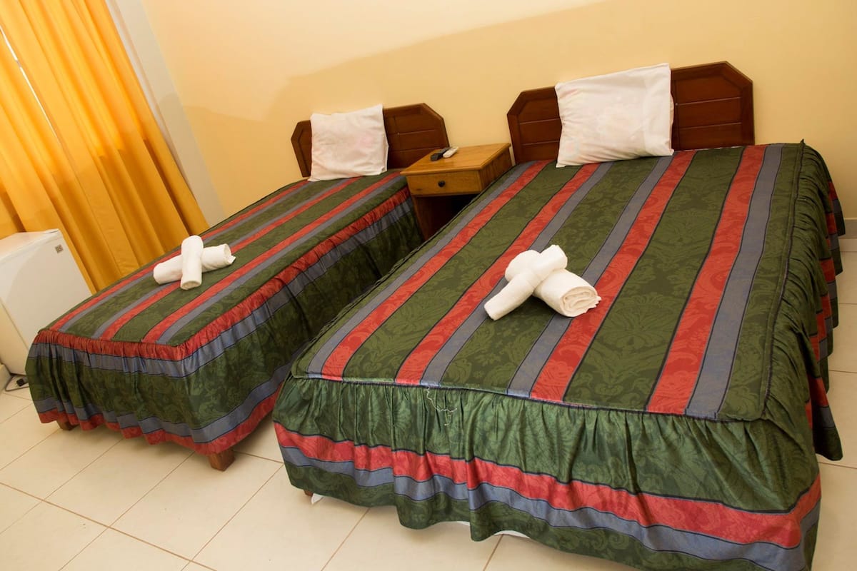 Double Room, Multiple Beds | Minibar, in-room safe, soundproofing, free WiFi