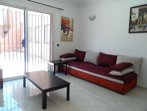 Apartamento | Área de estar | TV de tela plana