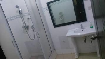 Premium Double Room | Bathroom | Rainfall showerhead, hair dryer, towels, soap
