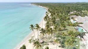 On the beach, sun loungers, beach towels