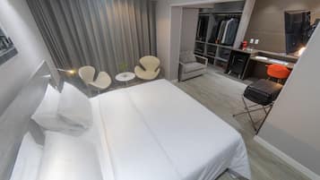 Premium Casal - 1 Cama King | 1 quarto, frigobar, Wi-Fi de cortesia, roupa de cama