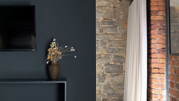 Suite estudio de lujo, 1 cama Queen size | Ropa de cama hipoalergénica y decoración personalizada