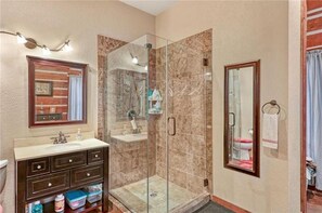Bathtub, hair dryer, towels, soap