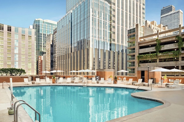 Seasonal outdoor pool, pool loungers