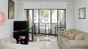 Condo, 1 King Bed with Sofa bed (Cabana-style waterfront condo steps t) | Living room