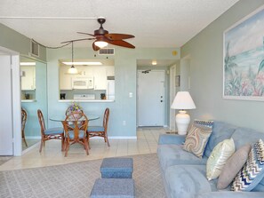 Condo, Multiple Beds (Tradewinds 410) | Living room | TV, books