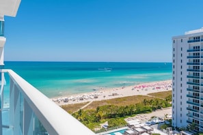 On the beach, sun-loungers, beach towels