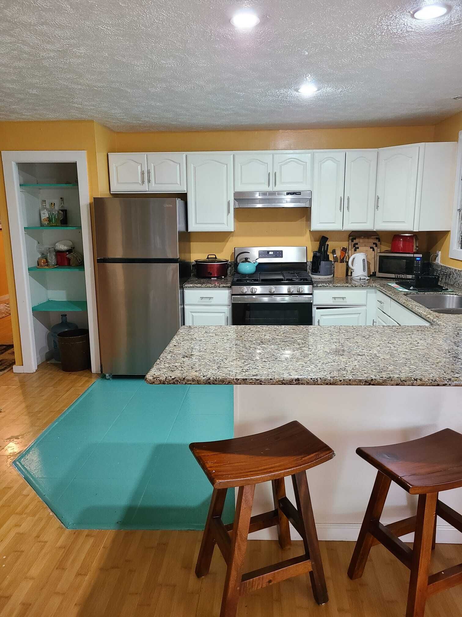 Fridge, microwave, stovetop, coffee/tea maker