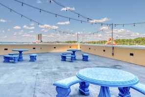 Relax on the outdoor terrace with a semi-circular seating area and enjoy the surrounding landscape views.