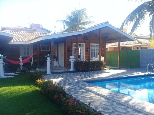 Chalet of noble wood. Forest environment.