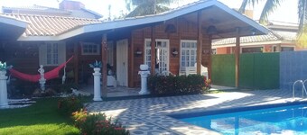 Chalet of noble wood. Forest environment.