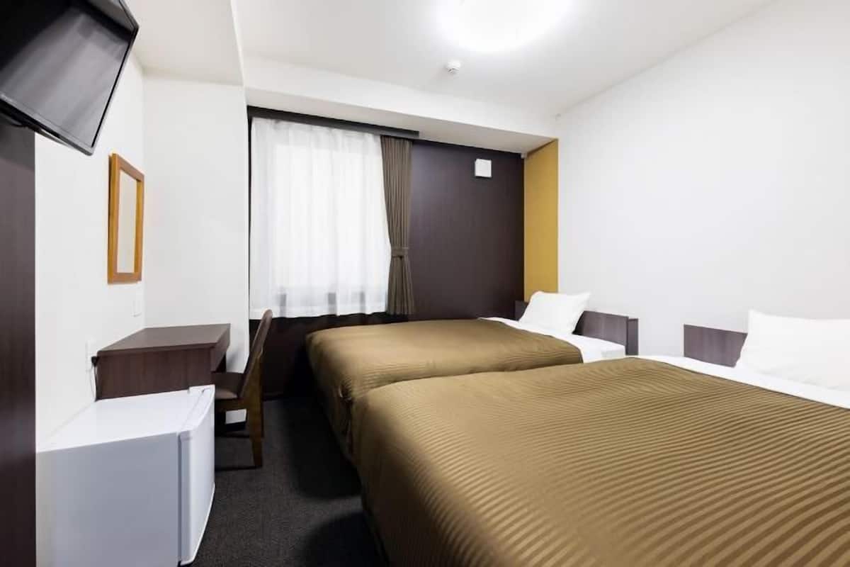 Desk, blackout curtains, free WiFi, bed sheets