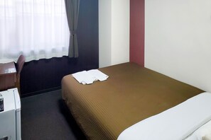 Desk, blackout curtains, free WiFi, bed sheets